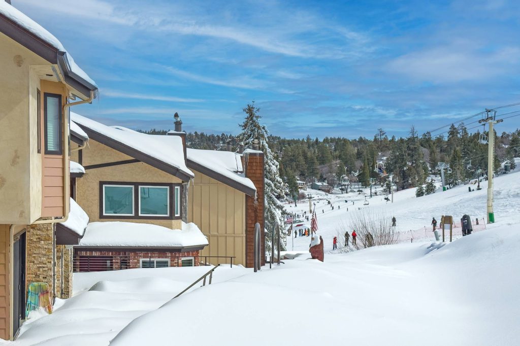 Close-up view of ski slope and chairlift next to Comstock Highlands condos