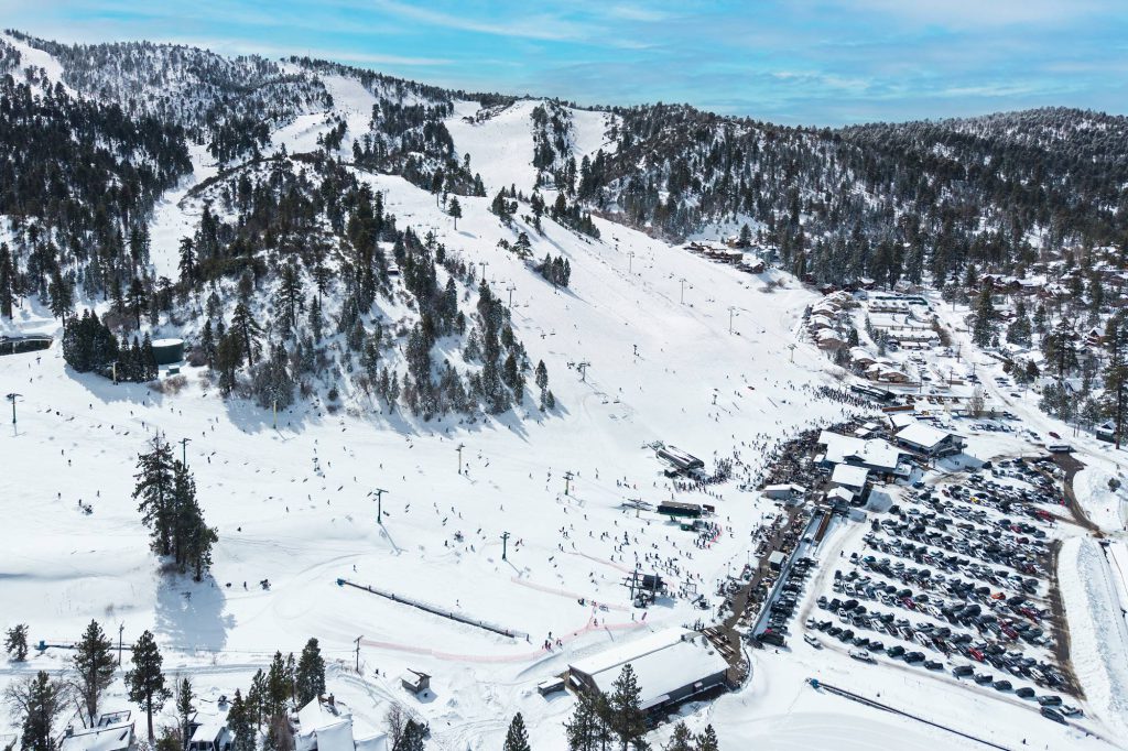 Expansive aerial of Bear Mountain ski area and parking lot in Big Bear Lake