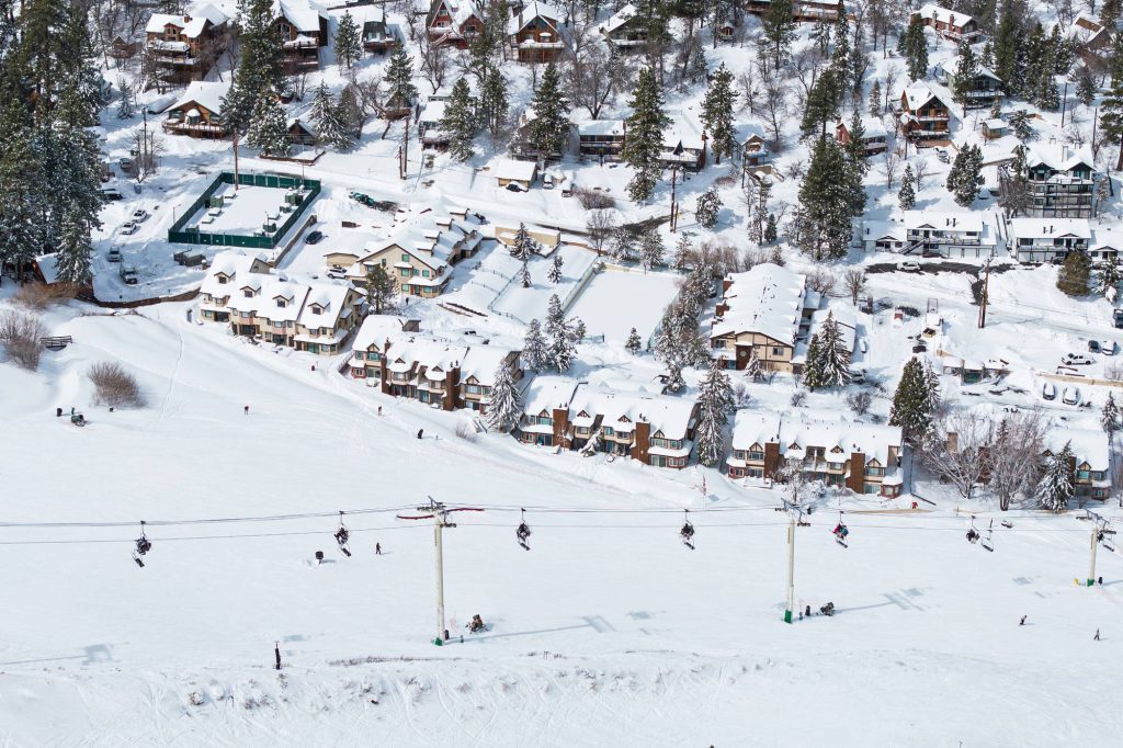 Comstock Highlands condos along Bear Mountain ski run in winter