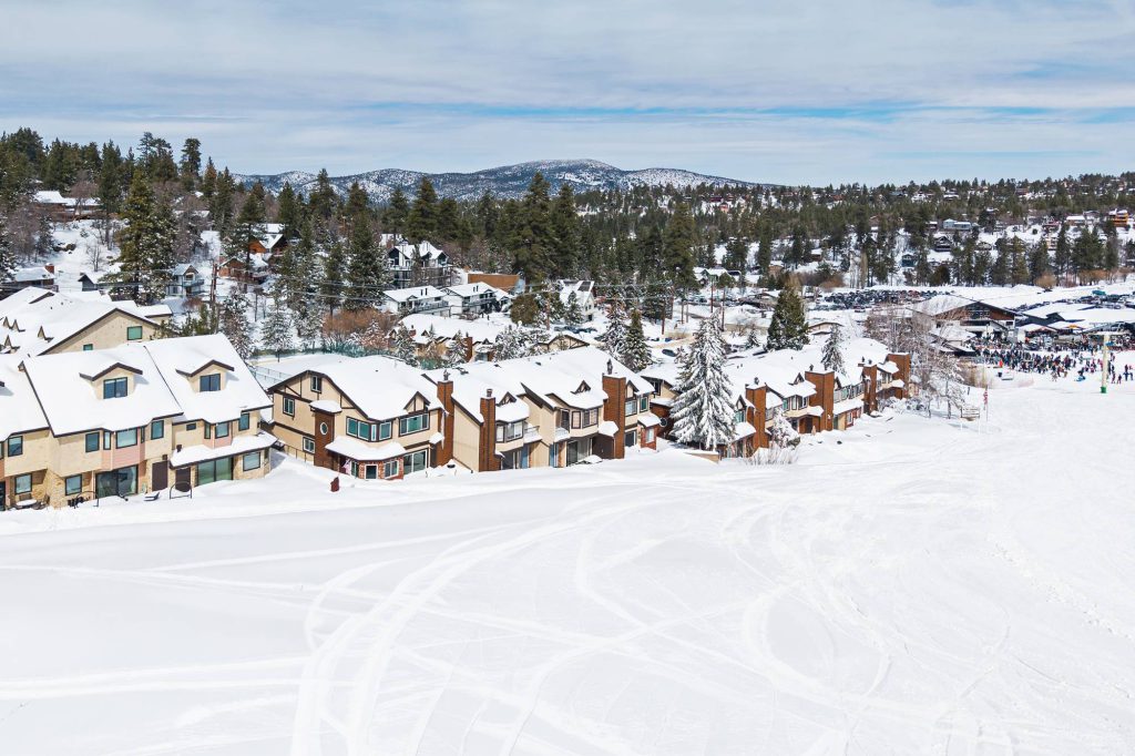 Wide aerial of Bear Mountain ski slopes and Comstock Highlands condos
