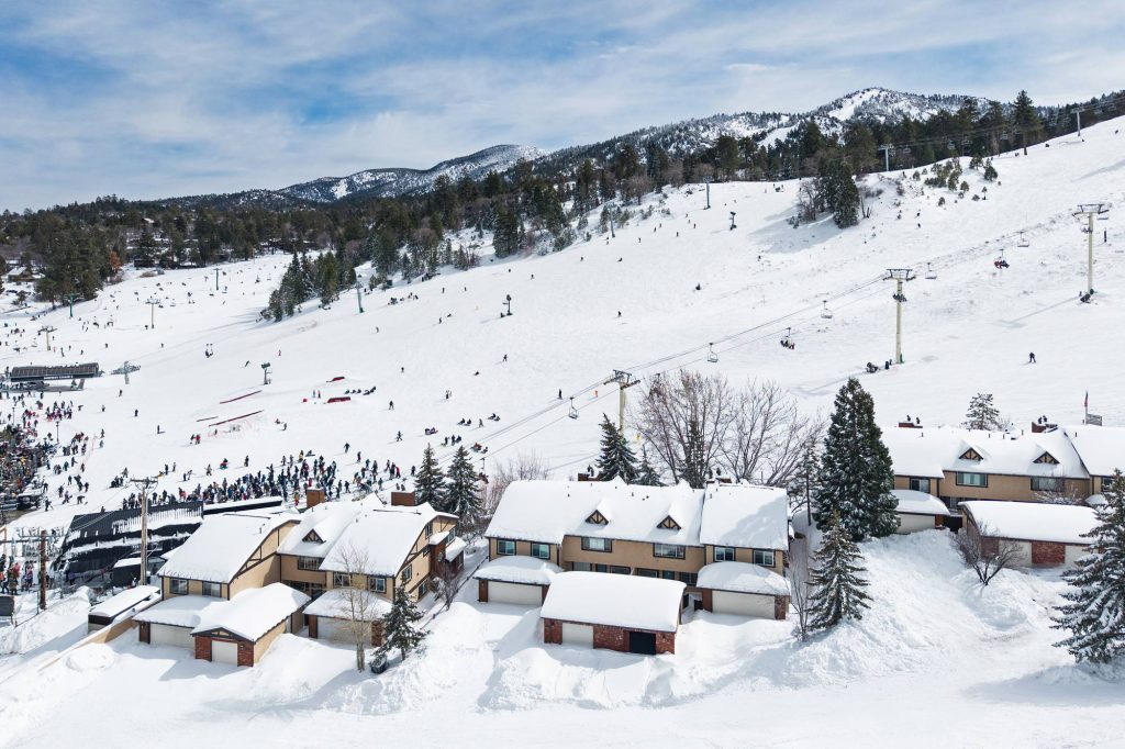 Elevated winter view of Comstock Highlands and surrounding ski terrain